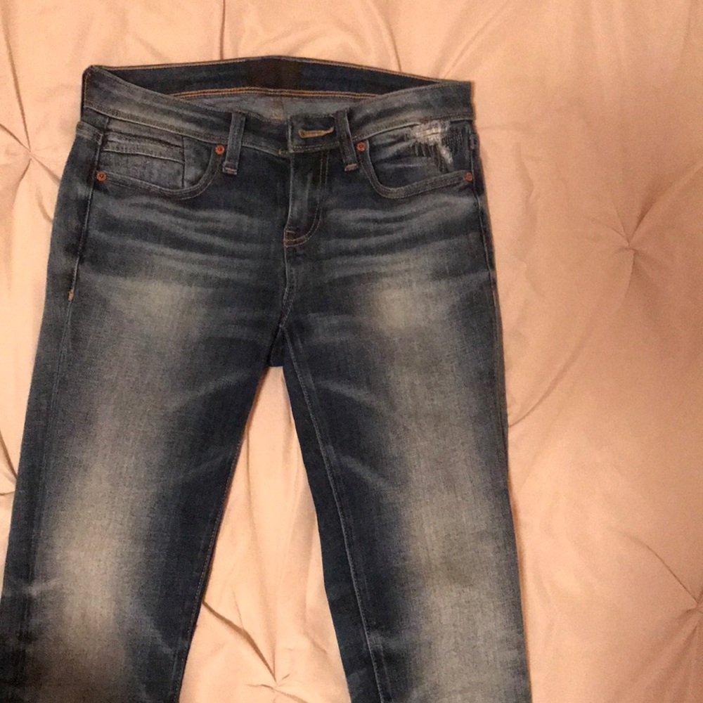 Buckle black skinny jeans